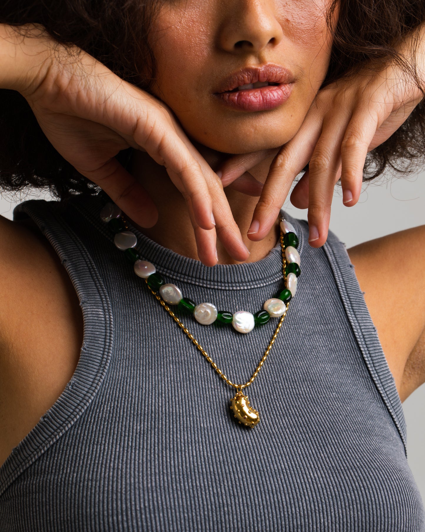 Model wearing "Green old choker". It's made of Old glass beads, Freshwater pearls and Silver 925 rhodium plated.