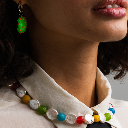 Model wearing choker crafted from unique vintage beads. Made of freshwater pearls, old glass beads and 925 rhodium plated silver