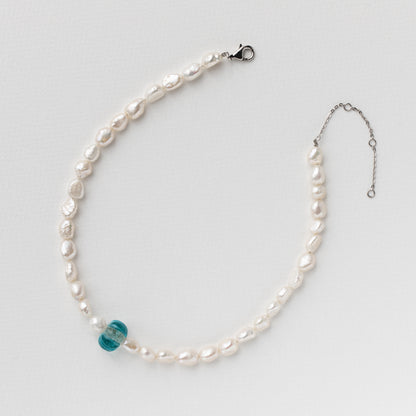 Necklace made of an old glass bead, freshwater pearls and 925 rhodium plated silver