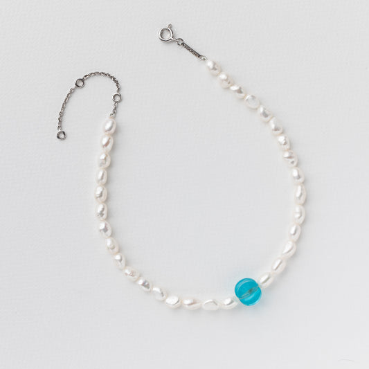 Necklace made of an old glass bead, freshwater pearls and 925 rhodium plated silver