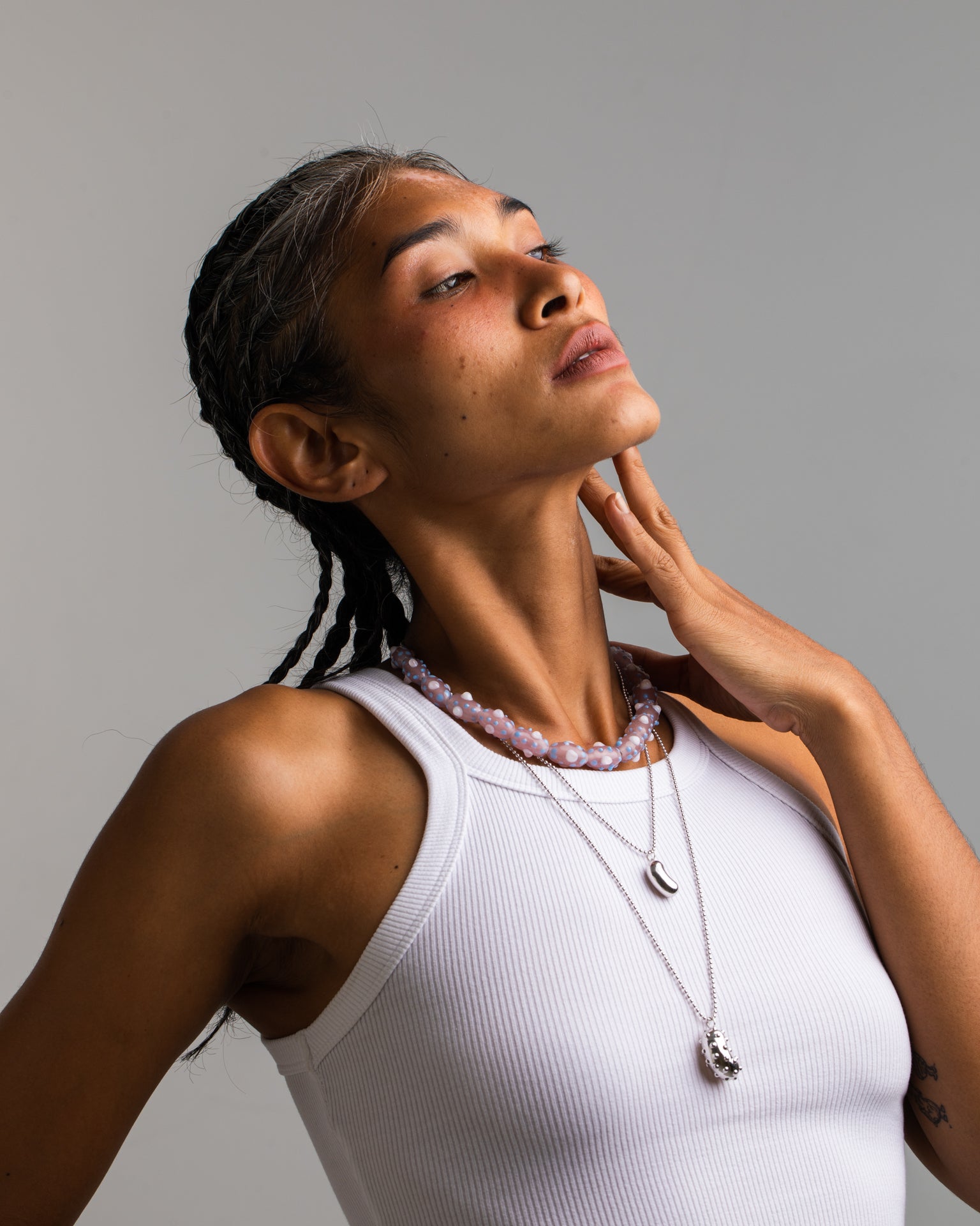 Model wearing beaded choker which is inspired by the beauty of tentacles. Each bead was blown by hand so each bead is unique and might slightly differs from each other.